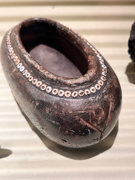 Native American steatite pot with bitumen and bead decoration